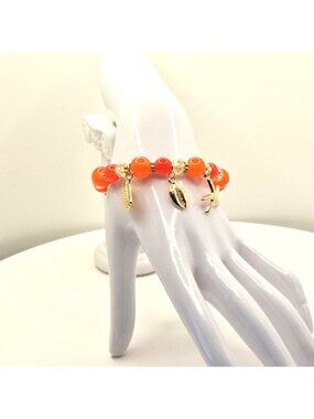 Beach-Inspired Charm Bracelet With Orange Beads Gold Tone Shell And Starfish